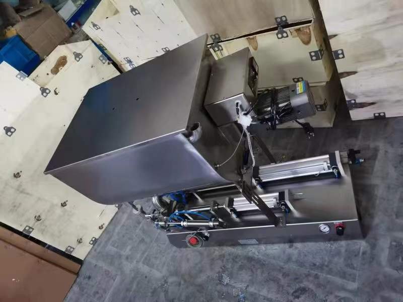 آلة تعبئة وتغليف نصف آلية بسعة 500 مل/1000 مل بفوهتين من رولان ⚙