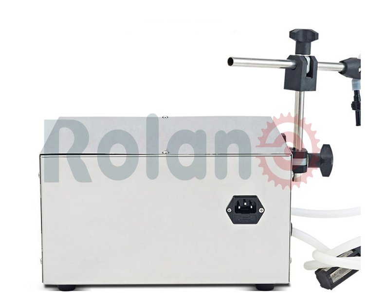 آلة تعبئة السوائل الكمية رولان ⚙