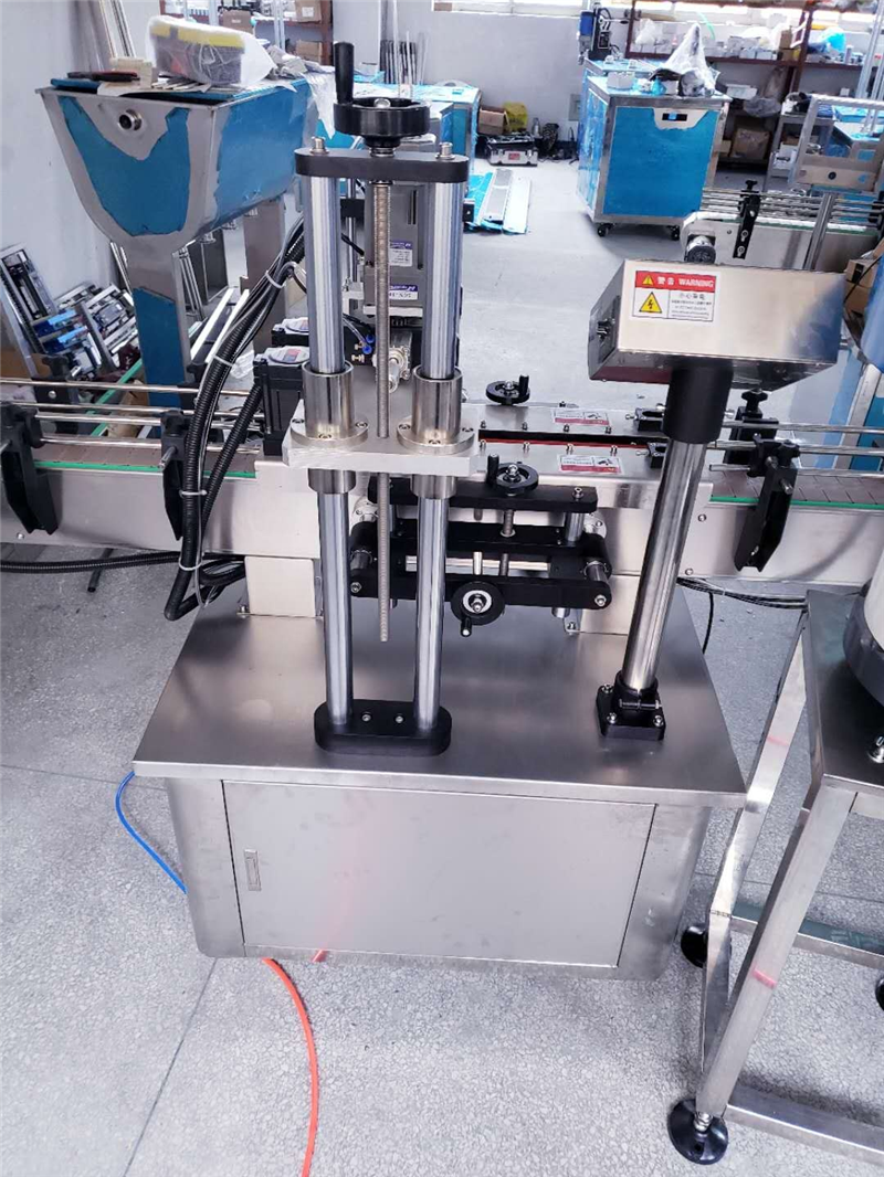 Automatically drop the lid+ Automatic conveyor lid +Automatic capping  machines Rolan ⚙
